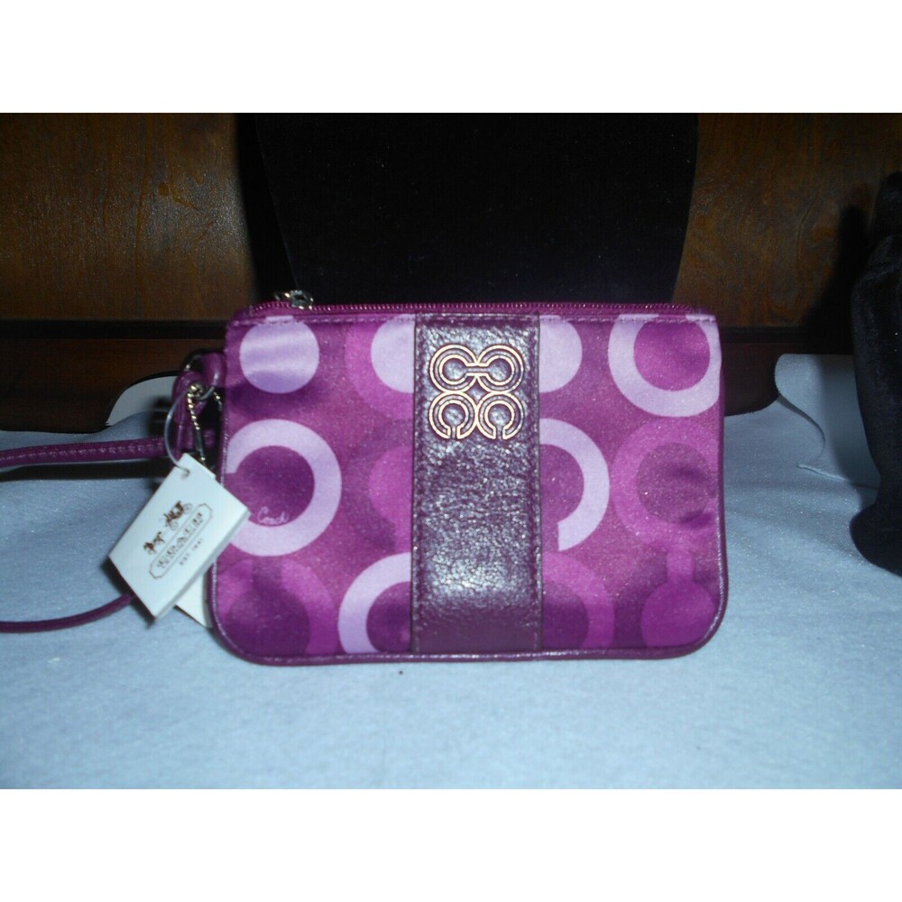 Brand New with tag Coach pink/purple wristlet